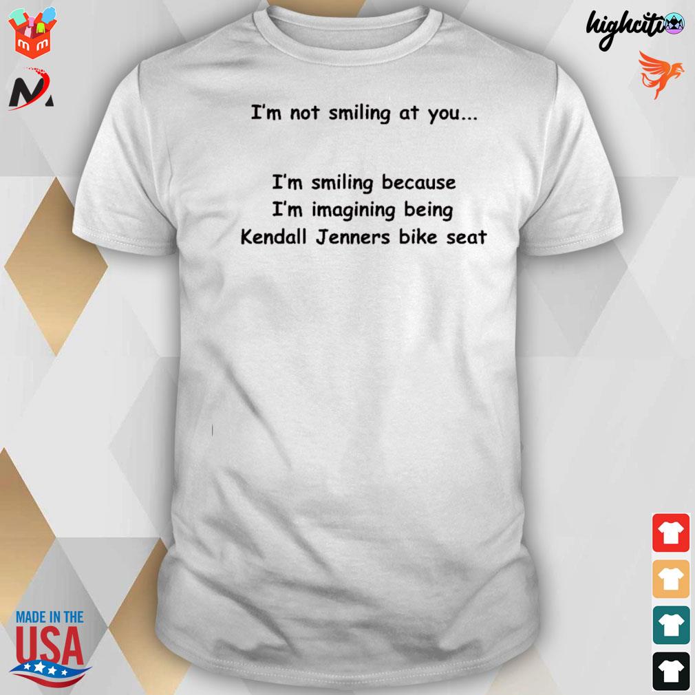I'm not smiling at you I'm smiling because I'm imaging being Kendall Jenners bike seat t-shirt
